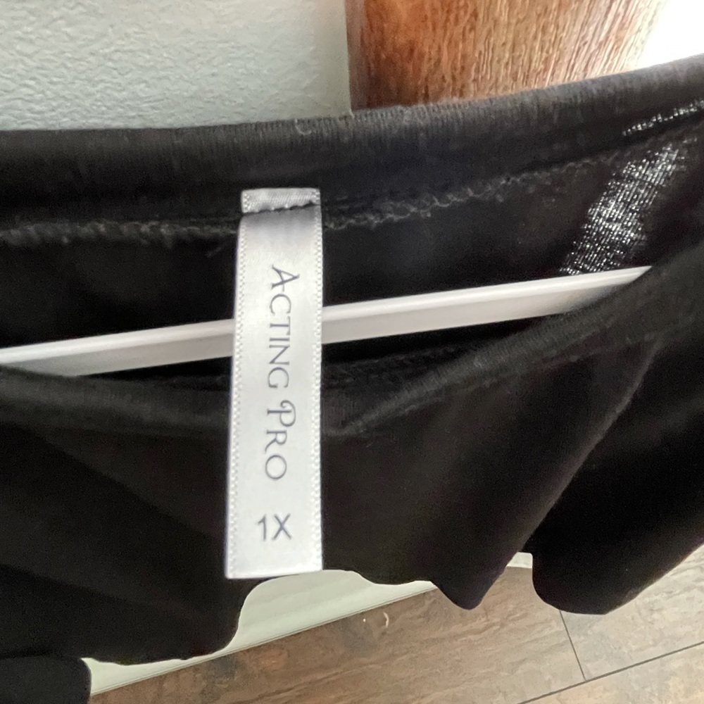 Womans flutter sleeve black top